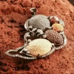 Handcrafted sterling silver pendant featuring genuine stingray leather, natural agate stones, and crystal accents in an ocean-inspired artisan design.