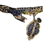 Handcrafted black silver brooch pendant with gold plating, natural sapphire, and tsavorite gemstones in an elegant convertible design.